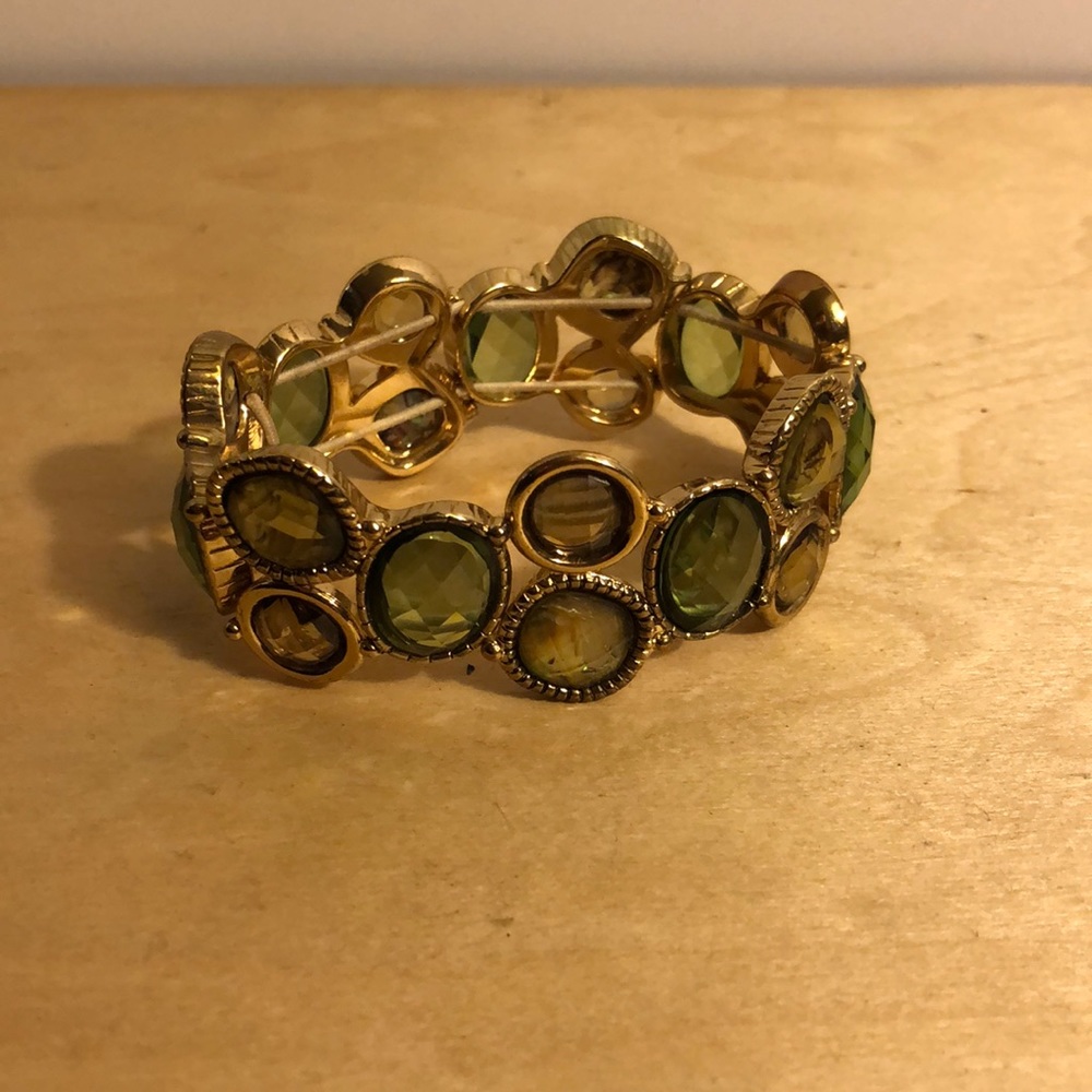 Gold and light green stone bracelet